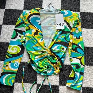 Groovy retro 70’s style shoulder padded top